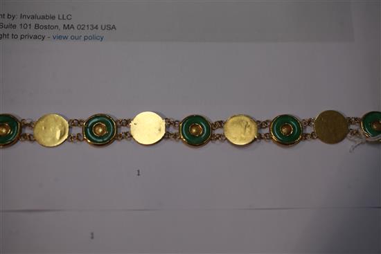 A Chinese gold and jadeite disc link bracelet, 6.75in.